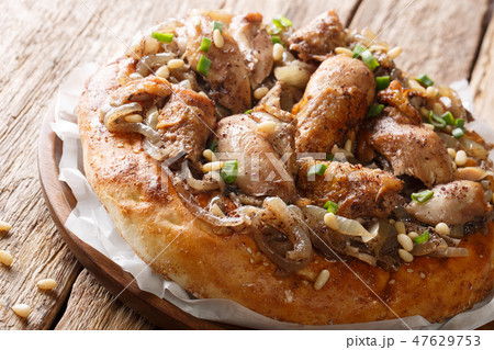 Palestinian chicken with sumac and onions Palestinian chicken with sumac and onions 47629753