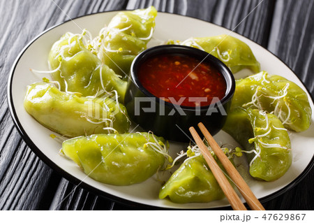 Delicious green gyoza with matcha Delicious green gyoza with matcha 47629867