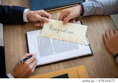 Businessman sending a resignation letter to employer boss in ord Businessman sending a resignation letter to employer boss in ord 47630877