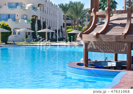 Swimming pool with bar on site in Egypt 47631068