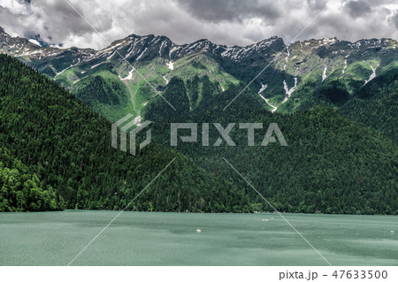 Mountains surrounding Ritsa Lake in an Abkhazia Mountains surrounding Ritsa Lake in an Abkhazia 47633500