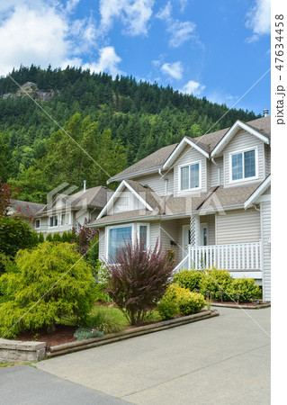 North American house in rural area with nicely landscaped front yard for sale 47634458