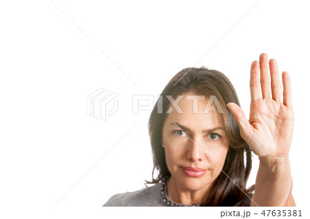 Woman showing stop gesture isolated 47635381