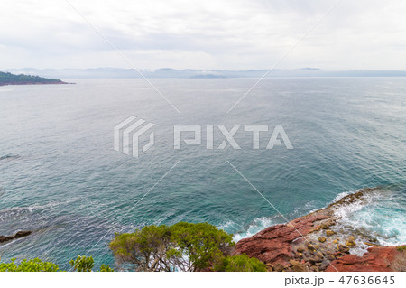 Marine red folded rocks Marine red folded rocks 47636645