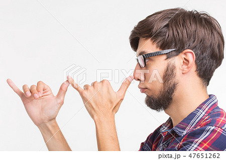Strange bearded man guy mocking having fun playing the fool on white background 47651262
