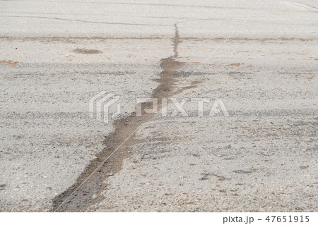 Close up asphalt road surface crack as long as fragile Close up asphalt road surface crack as long as fragile 47651915