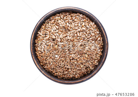 flax seeds in a plate isolated flax seeds in a plate isolated 47653286