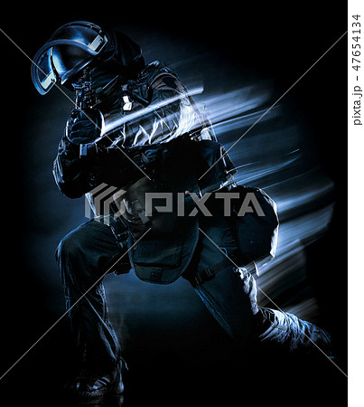 one soldier police swat tactical forces man isolated black backg one soldier police swat tactical forces man isolated black backg 47654134