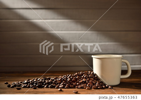 Cup of coffee and coffee beans  47655363