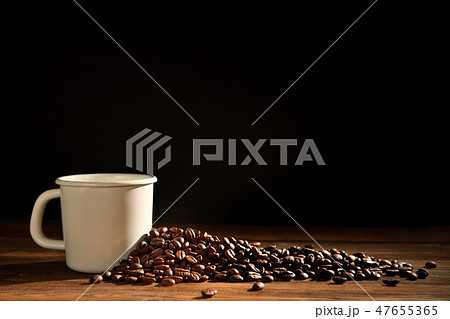 Cup of coffee and coffee beans Cup of coffee and coffee beans 47655365