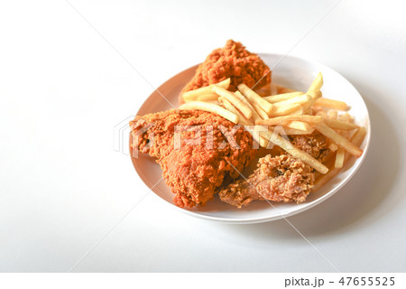 fried chicken and fries 47655525