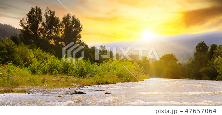 Bright sunrise in the mountains of the Carpathians Bright sunrise in the mountains of the Carpathians 47657064