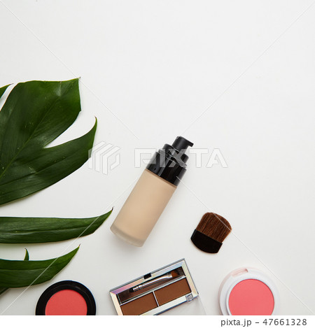 Make up products and brushes on white Make up products and brushes on white 47661328