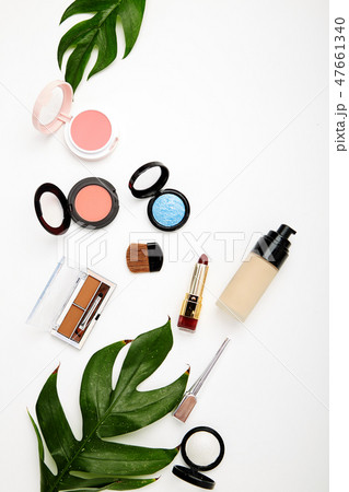 Make up products and brushes on white Make up products and brushes on white 47661340