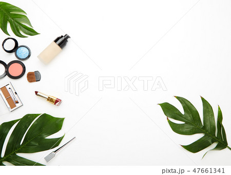 Make up products and brushes on white 47661341
