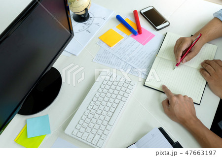 woman and man work for education or business on the table woman and man work for education or business on the table 47663197