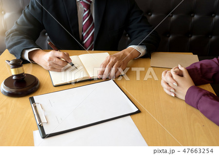 Judge gavel with Justice lawyers having team Judge gavel with Justice lawyers having team 47663254