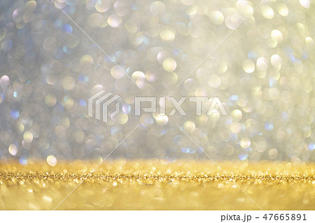 Abstract background filled with shiny gold and multicolour glitter Abstract background filled with shiny gold and multicolour glitter 47665891