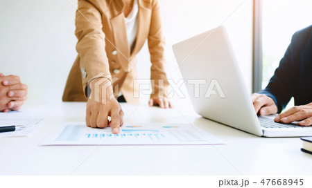 Group of business people discussing valuation of real estate wit 47668945