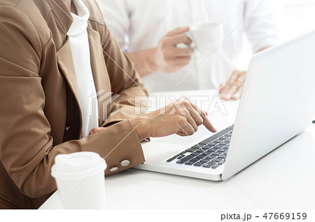 two business executives friendship at a cafe or working space an two business executives friendship at a cafe or working space an 47669159