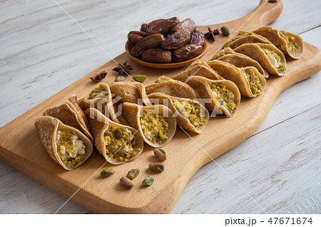 Arabian pancake stuffed with sweet cheese.  47671674