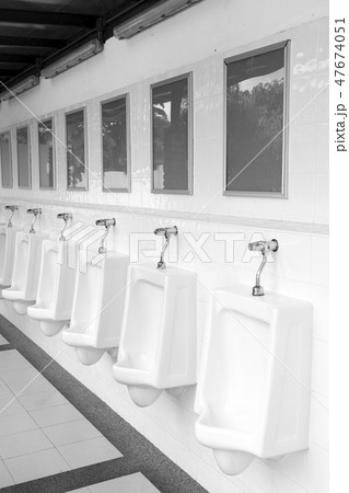 Men toilet with empty advertising sign Men toilet with empty advertising sign 47674051