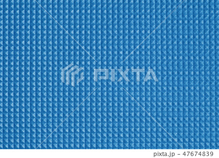 Square pattern of soft plastic mat. Closeup. 47674839