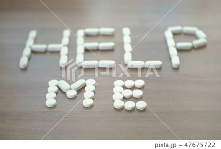 word - help me - consists of tablets on the table word - help me - consists of tablets on the table 47675722