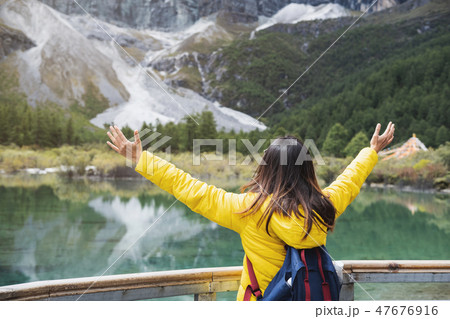 young woman traveler looking beautiful landscape 47676916