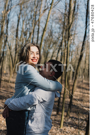 Happy couple in love hugging and sharing emotions Happy couple in love hugging and sharing emotions 47680428