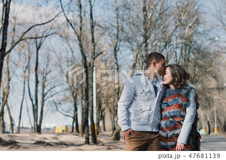Happy couple in love hugging and sharing emotions Happy couple in love hugging and sharing emotions 47681139