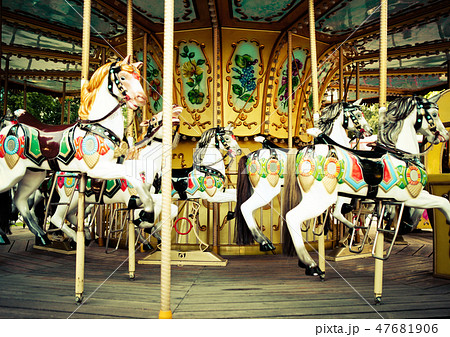 Horses on a carnival Merry Go Round 47681906