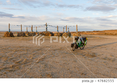 Mongolian Ovoo and bicycle Mongolian Ovoo and bicycle 47682555
