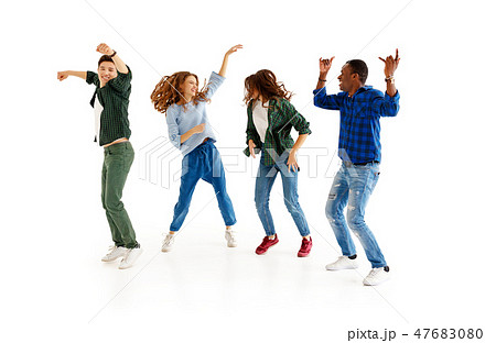 group of cheerful young people isolated on white group of cheerful young people isolated on white 47683080