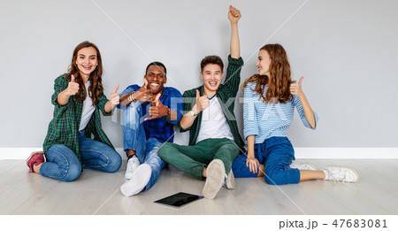 group of cheerful young people men and women group of cheerful young people men and women 47683081