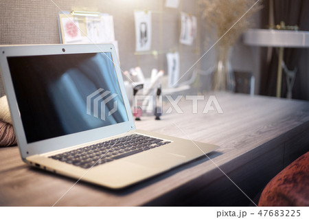 blank laptop on wood table in lady room blank laptop on wood table in lady room 47683225