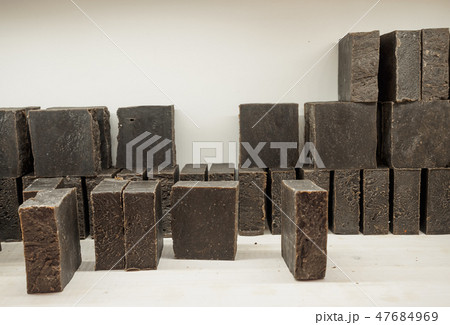 Bars of soap on a shop window. Tar soap with natural cedar oil, turpentine and herbal ingredients 47684969