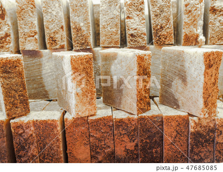 Bars of soap on a shop window. Cinnamon soap with natural cedar oil and herbal ingredients. Handmade Bars of soap on a shop window. Cinnamon soap with natural cedar oil and herbal ingredients. Handmade 47685085