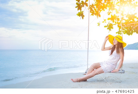 Women travel at the beach on Summer Vacation 47691425