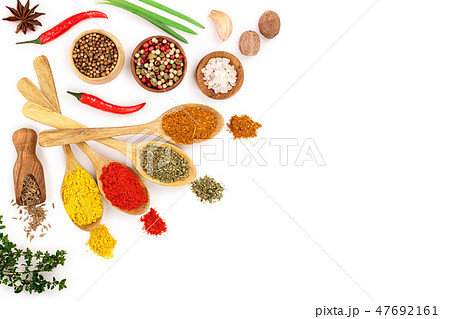 mix of spices in wooden spoon isolated on a white background with copy space for your text. Top view mix of spices in wooden spoon isolated on a white background with copy space for your text. Top view 47692161