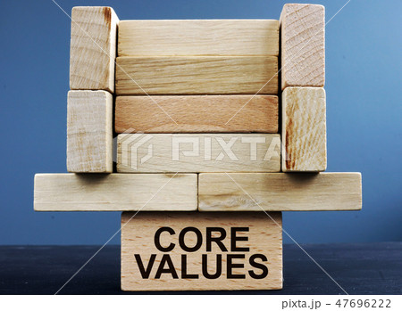 Tower of wooden blocks with sign core values. 47696222