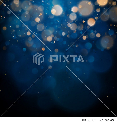 Blurred bokeh light on dark blue background. Christmas and New Year holidays template. Abstract 47696409