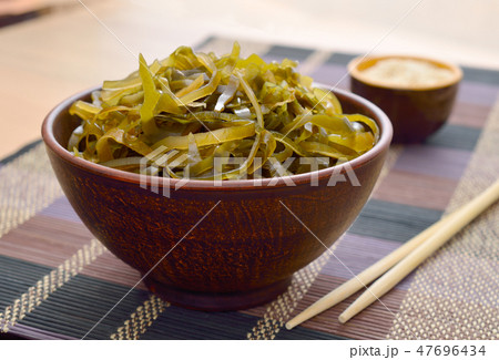 Kelp ( laminaria ) in a bowl. Kelp ( laminaria ) in a bowl. 47696434