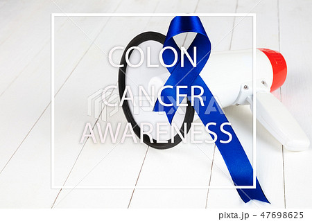 Colon cancer awareness poster. Blue ribbon made of dots on white background. Medical concept. Colon cancer awareness poster. Blue ribbon made of dots on white background. Medical concept. 47698625