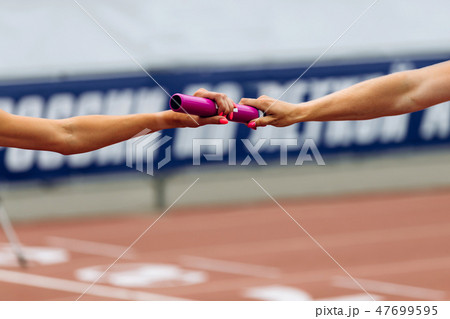 relay race racing hands women runners relay race racing hands women runners 47699595