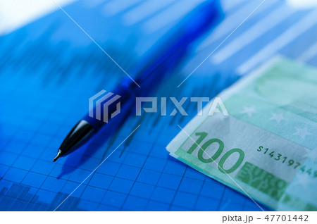 Finance background with money, stock market chart, graph and pen. Economy and business concept. 47701442