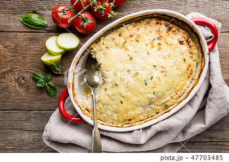 Casserole with chicken and zucchini 47703485