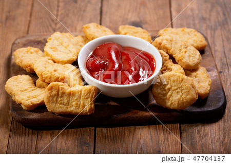 chicken nuggets with ketchup chicken nuggets with ketchup 47704137