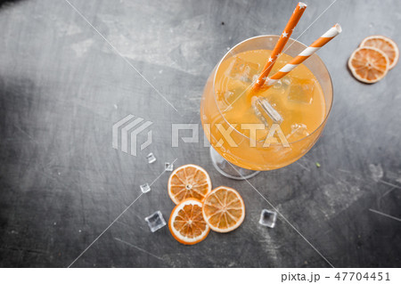 Glass of aperol soda cocktail Glass of aperol soda cocktail 47704451