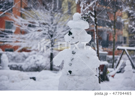 Big snowman in the city 47704465